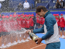 Rafael Nadal sprays champagne following his Barcelona Open win