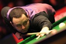 Stephen Maguire of lines up a shot 