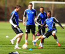 Frank Lampard and Ashley Cole compete for the ball 
