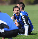 Frank Lampard laughs during a training session