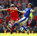 Leon Osman and Steven Gerrard battle for the ball