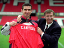 Sir Alex Ferguson poses with Eric Cantona