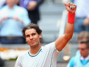 Rafael Nadal celebrates defeating Benoit Paire 