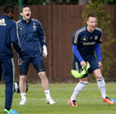 Frank Lampard and John Terry laugh during a Chelsea training session