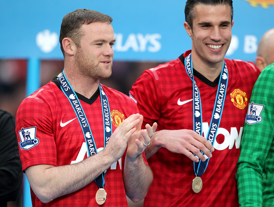 Wayne Rooney and Robin van Persie during the the trophy celebrations