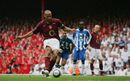 Thierry Henry strokes home a penalty