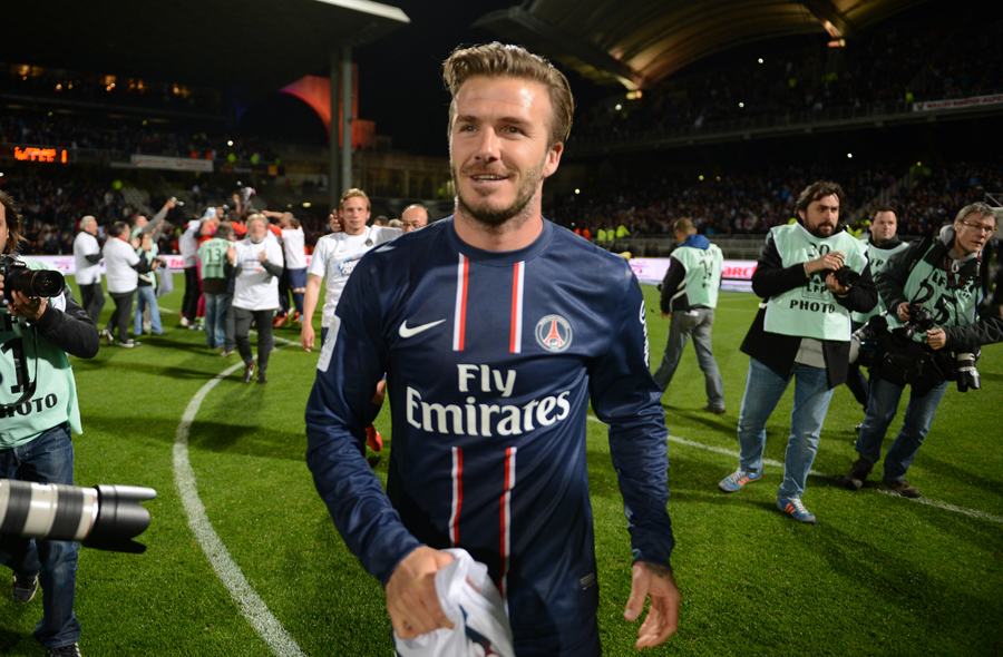 David Beckham celebrates winning the title