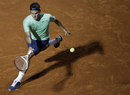 Roger Federer reaches for a forehand