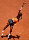 Serena Williams serves a ball to Victoria Azarenka