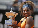 Serena Williams holds the trophy