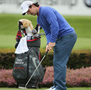 Rory McIlroy practises his putting stroke