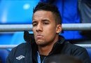 Scott Sinclair looks glum on the Manchester City bench