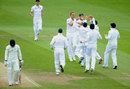 Stuart Broad is congratulated after removing Brendon McCullum