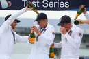 Joe Root and Jonny Bairstow get doused in champagne
