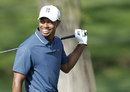 Tiger Woods smiles during practice