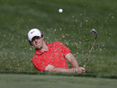 Rory McIlroy hits out of a bunker