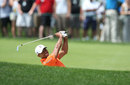Tiger Woods plays a shot on the first hole
