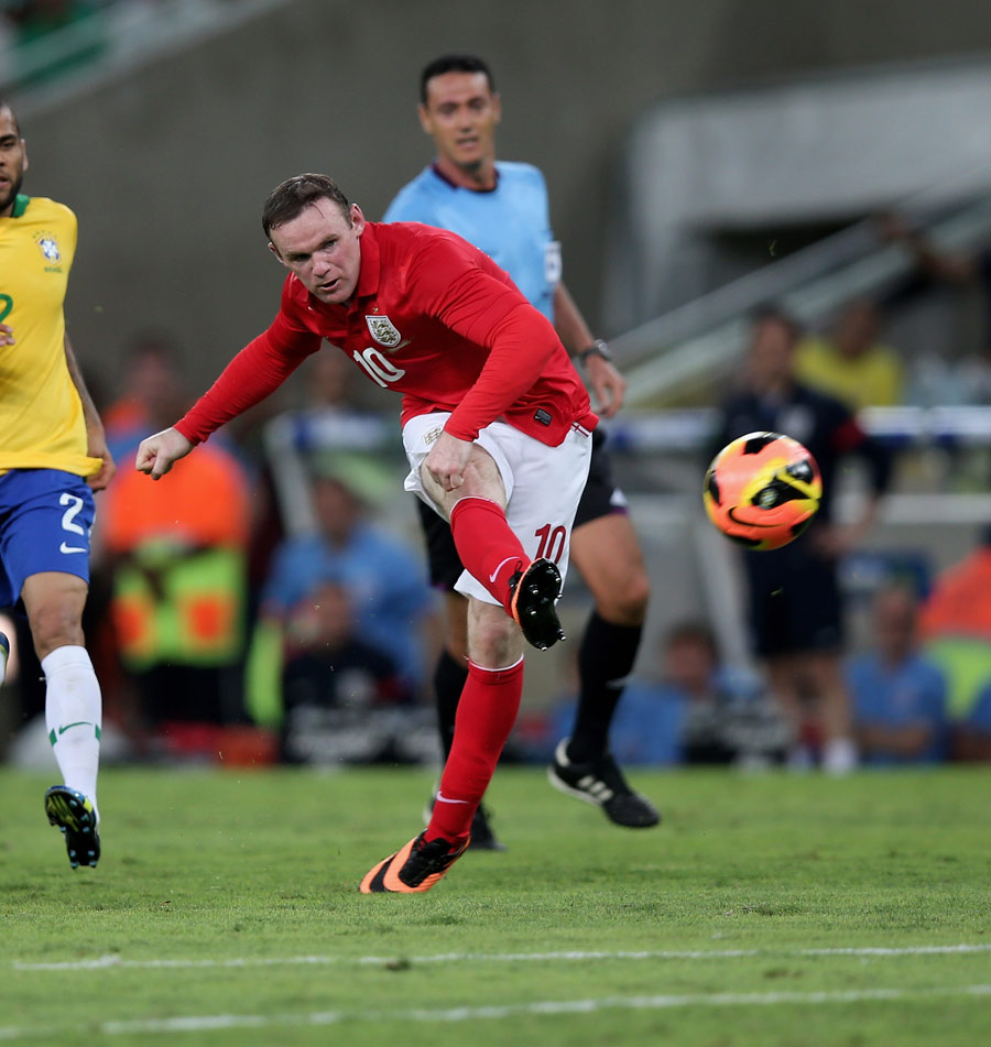 Wayne Rooney fires a shot on goal
