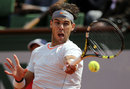 Rafael Nadal plays a forehand
