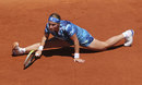 Svetlana Kuznetsova stretches for a ball