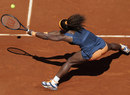 Serena Williams stretches for a ball