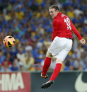 Wayne Rooney attempts a header