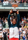 Rafael Nadal holds the French Open trophy
