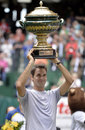 Roger Federer lifts the Gerry Weber Open trophy