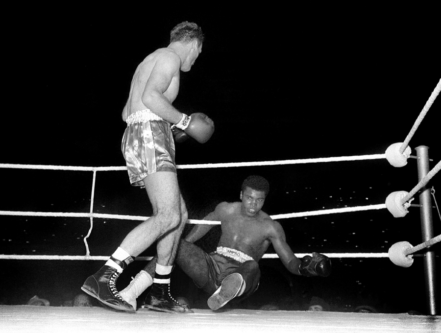 Henry Cooper floors Cassius Clay for the first time in his career