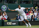 Jo-Wilfried Tsonga stretches to reach a serve