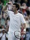 Andy Murray shows his muscle to the crowd