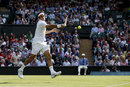 Roger Federer flies with a forehand
