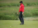 Rory McIlroy walks after a putt