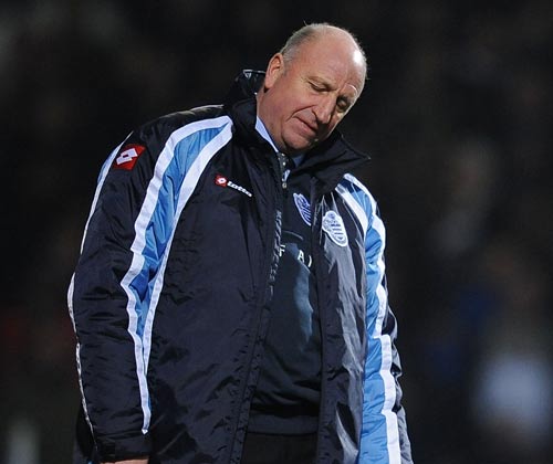 Paul Hart stands dejected on the touchline