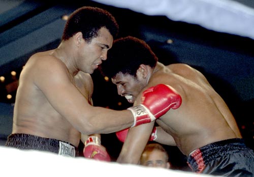 Leon Spinks and Muhammad Ali at close quarters 
