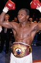 Chris Eubank celebrates after beating Canada's Dan Sherry for the WBO Middleweight title