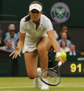 Laura Robson stoops for a backhand
