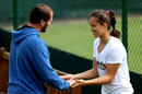 Laura Robson plays a game with her coach