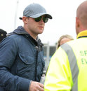 Wayne Rooney chats to a security guard backstage