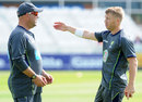 David Warner chats with Darren Lehmann before the day's play
