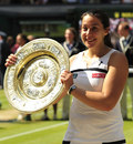 Marion Bartoli poses with her trophy