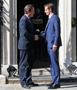 Andy Murray chats with Prime Minister David Cameron after winning Wimbledon