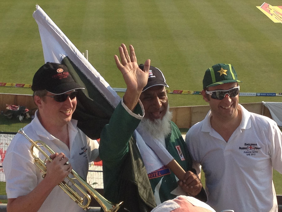 Billy Cooper, the Barmy Army trumpeter, with Chacha, the Pakistan cheerleader