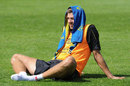 Steven Gerrard cools down with a towel on his head