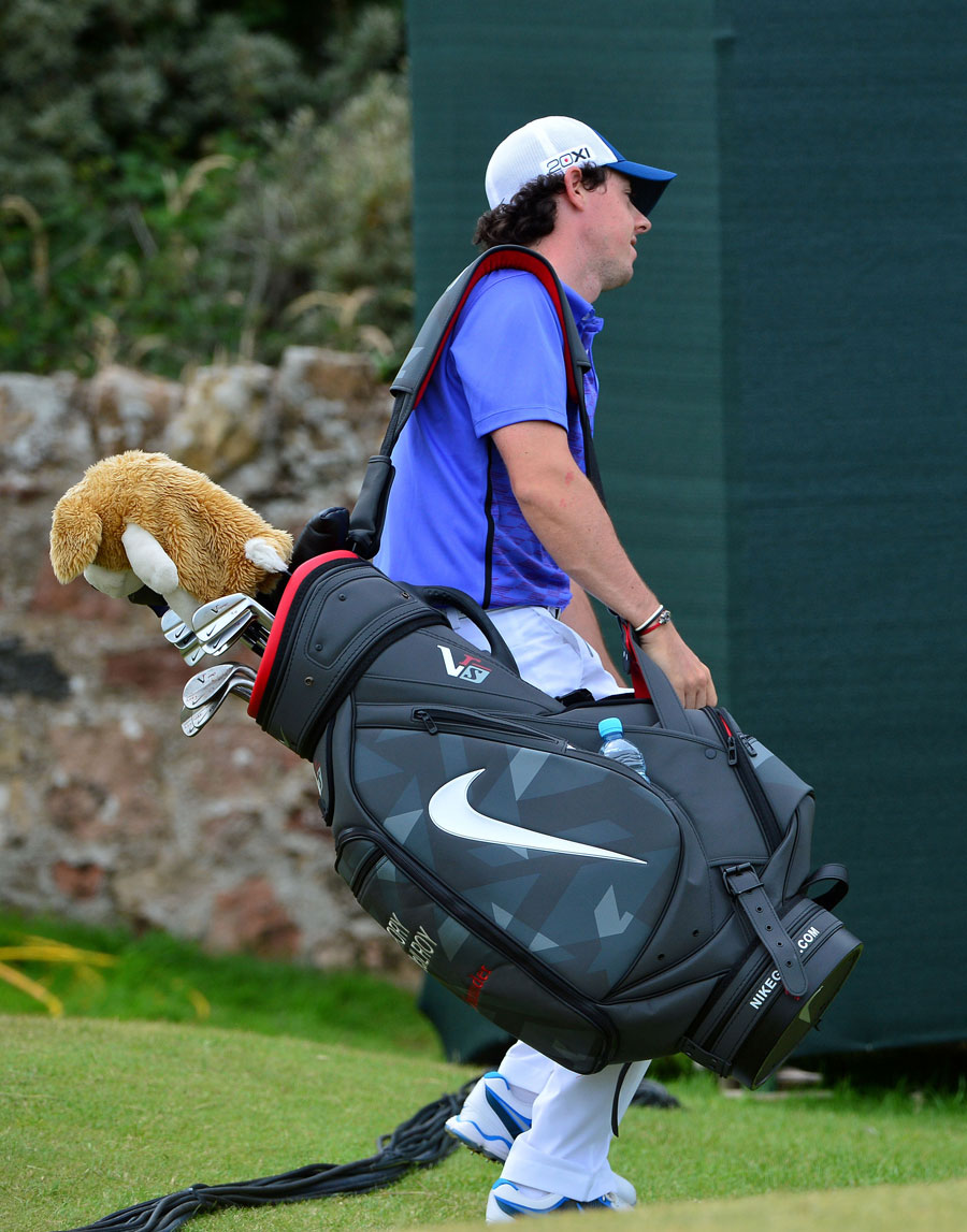 Rory McIlroy carries his own clubs