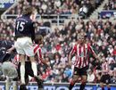 Peter Crouch heads in a goal