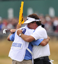 Phil Mickelson celebrates with his caddie
