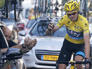 Chris Froome toasts his victory