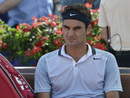 Roger Federer cuts a dejected figure