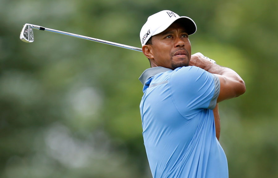 Tiger Woods hits off the seventh tee